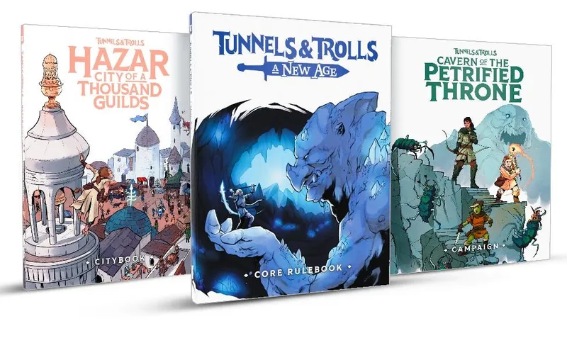 Three hardcover books from the Tunnels & Trolls: A New Age campaign are displayed. The left book, titled "Hazar: City of a Thousand Guilds," features a colorful illustration of a bustling city scene with various characters and buildings. The center book, "Tunnels & Trolls: A New Age - Core Rulebook," showcases a dramatic image of a character facing a large creature in a cave-like setting. The right book, "Cavern of the Petrified Throne," has a more subdued design with intricate artwork.