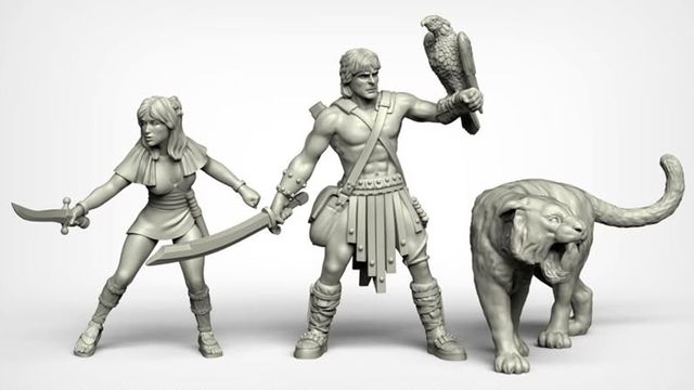 A set of three fantasy miniatures features a muscular male hero wielding a sword and holding a falcon, alongside a svelte female character brandishing a dagger. Both figures are depicted in a dynamic pose, showcasing intricate details in their clothing and accessories, reminiscent of 80s high-fantasy cinema. The miniatures are presented in a light gray color, highlighting their sculptural features.