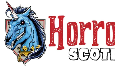 A stylized logo features a blue unicorn with a fierce expression, showcasing sharp teeth and a prominent horn. The unicorn is adorned with a golden collar and is set against a shield-like background. The text "Horror Scotland" is prominently displayed in bold, red letters, with a distressed texture, emphasizing the event's horror theme.