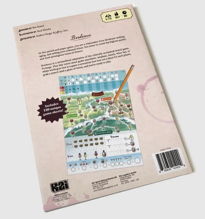 The back cover of a Bordeaux game booklet. The cover is light beige with red wine stain graphics. At the top, there is text: "DESIGNED BY Ben Rosset", "ILLUSTRATED BY Pavel Zhovba", "DEVELOPED BY Andrew Nerger & Jeffrey Chin". Below, the title "Bordeaux" is prominently displayed. The main section contains descriptive text about the game. A pencil is resting on the booklet, pointing to a colorful map of Bordeaux with vineyards, wine bottles, and barrels. At the bottom left, there is a logo for R2i Games and publisher information. On the right side, there is a barcode and text "Made in China". A burst graphic states "Includes 150 unique game sheets!". The top right corner shows icons for player count (1-75), age (10+), and duration (30).