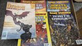 A selection of eary 90s white dwarf and dragon magazines showing the classic stylings
