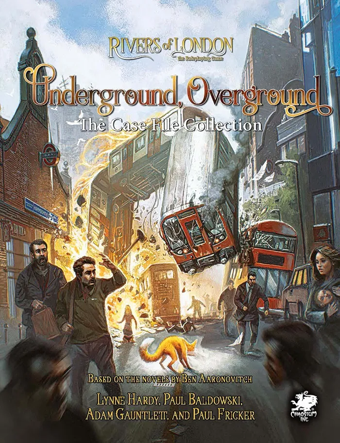 A chaotic urban street scene with a red double-decker bus and a subway train suspended in mid-air, flames erupting from the ground. Several people in modern and period clothing are scattered across the street, some running, others standing in shock. A fox with glowing eyes walks in the foreground. Buildings with brick facades and a London Underground sign are visible in the background. The text at the top reads "Underground, Overground The Case File Collection" and at the bottom "Based on the novels by Ben Aaronovitch". The top left corner includes the text "Rivers of London the Roleplaying Game".