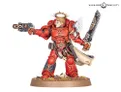 Red-armored figure with wings, halo, holding a gun and chainsword, on a base.