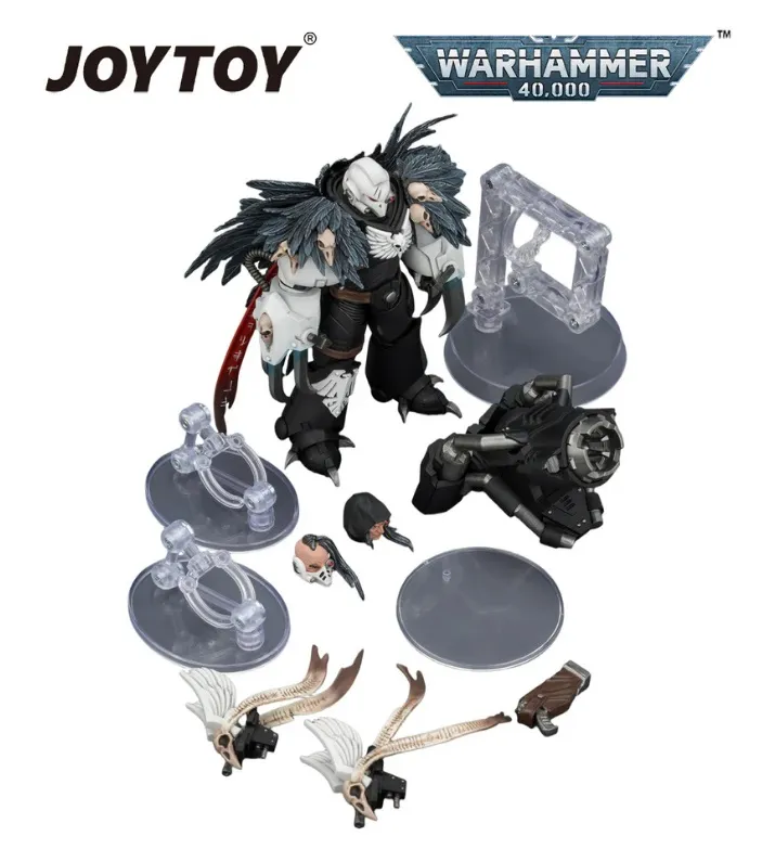 A figure with a black and white armored suit, large feathered wings, and a skull-like helmet stands in the center. It holds a long red weapon and has a detailed belt with pouches. Surrounding the figure are various interchangeable parts, including multiple heads, arms, wing pieces, and accessories, all displayed on clear plastic stands. In the top left corner, the text "JOYTOY" is visible. In the top right corner, the text "WARHAMMER 40,000" is displayed on a blue and silver banner.