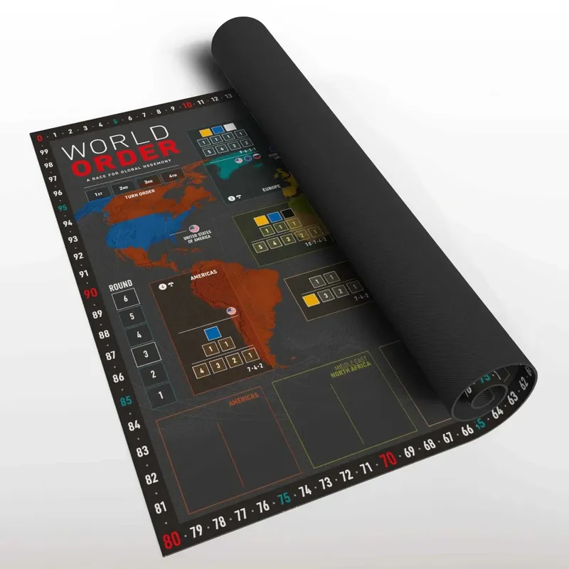 Rolled-up World Order game mat with maps, scores, and text "WORLD ORDER A RACE FOR GLOBAL HEGEMONY".