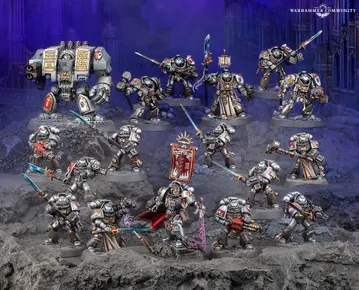 A detailed display of Black Templar miniatures showcases a variety of armored figures in silver and black, set against a dark, rocky backdrop. Prominent in the scene is a Venerable Dreadnought on the left, flanked by a mix of characters including the Emperor’s Champion, Bladeguard Veterans, and Sword Brethren, all wielding swords and other weapons. The figures are intricately painted, with some holding banners and others poised for battle, creating a dynamic and imposing presence.