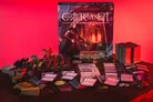 Castle Ravenloft Board Game box, miniatures, cards, and tokens on a table.