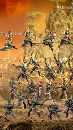 A dynamic display of Drukhari miniatures showcases a variety of figures, including the prominent Archon Lady Malys in the foreground, wielding a barbed longsword. Surrounding her are several lethal lieutenants and warriors, each adorned with intricate armor and weapons, set against a dramatic backdrop of rocky terrain and a fiery sky. The scene captures the essence of the Drukhari's dark and menacing aesthetic, highlighting their agility and deadly prowess in battle.