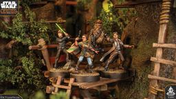 A group of four detailed miniatures from the Star Wars franchise stands on a wooden platform surrounded by lush greenery. The characters include a young man wielding a green lightsaber, a woman holding a blaster, and a figure resembling Chewbacca, alongside another character in a brown coat. The scene is set in a vibrant, natural environment, enhancing the adventurous theme of the miniatures.