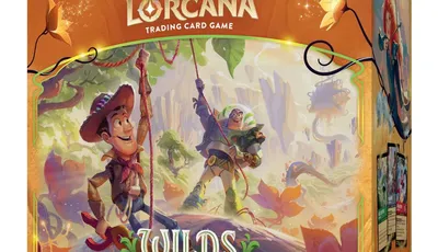 A colorful box for the Disney Lorcana Trading Card Game expansion titled "Wilds Unknown," featuring characters from Toy Story, Buzz Lightyear and Woody, depicted in a vibrant, adventurous landscape filled with lush greenery and fantastical elements. The title "WILDS UNKNOWN" is prominently displayed at the center, with the subtitle "ILLUMINEER'S TROVE" below it. The box design includes whimsical details and a logo for Ravensburger, enhancing the adventurous theme of the set.