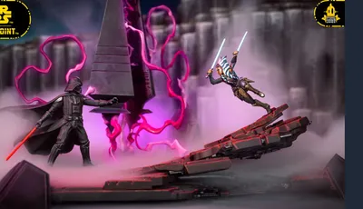 The image features a dynamic scene from the Star Wars: Shatterpoint game, showcasing miniatures of Ahsoka Tano and Darth Vader engaged in a duel. Ahsoka, wielding two lightsabers, is positioned in an action pose, while Darth Vader stands menacingly with his red lightsaber drawn. The backdrop includes a detailed scenic terrain piece resembling a Sith temple, with swirling purple energy and mist adding to the dramatic atmosphere of their confrontation.