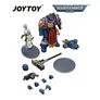 Blue armored figure with red cape, smaller white figure, weapons, and accessories. Text: JOYTOY WARHAMMER 40,000