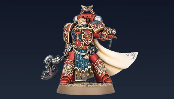 Aster Crohne, a new miniature from Games Workshop, is depicted as a Blood Angels veteran. He wears ornate red armor adorned with gold details and intricate patterns, complemented by a flowing white cape. In one hand, he wields a large, menacing weapon, while his other hand is outstretched, suggesting a commanding presence. The base features a sandy texture, enhancing the overall dynamic of the figure against a dark background.