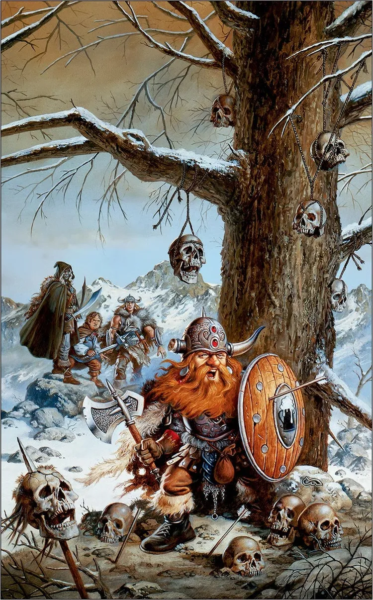 A fierce warrior with a long, red beard and horned helmet kneels in the foreground, wielding an axe and shield, surrounded by skulls in a snowy landscape. Behind him, a group of adventurers, including a cloaked figure and a young boy, traverse the rugged terrain, with mountains visible in the background. A large tree looms nearby, adorned with more skulls, adding to the ominous atmosphere of the scene.