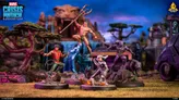 Four painted miniatures: Shang-Chi, Namor, Black Panther, and Silver Sable, on bases with terrain.