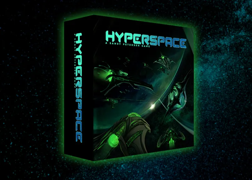 A box for the sci-fi board game "Hyperspace" is prominently displayed against a dark, starry background. The box features bold, glowing blue text of the title "HYPERSPACE" along with the subtitle "A SANDY PETERSEN GAME." The artwork on the box showcases various sleek, futuristic spacecraft in vibrant green tones, suggesting themes of interstellar exploration and competition.