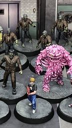 A collection of 30mm scale resin miniatures from the "Monsters Invaded My Town" set features various characters, including 16 zombies, a Frankenstein figure, a Sludge creature, a Werewolf, and two heroes. The scene includes five pumpkin spawn points, with the miniatures displayed on 32mm black plastic bases. The background shows a stylized urban environment, enhancing the thematic elements of the game.