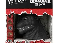 Yahtzee Godzilla box with Godzilla dice cup and red dice.