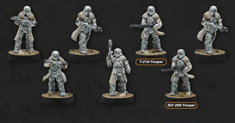 A group of six miniatures representing Imperial Range Troopers, each dressed in white and gray winter gear, stands against a dark background. The troopers are equipped with various weapons, including rifles and blasters, and feature distinctive fur-lined capes. Labels identify two of the troopers as 