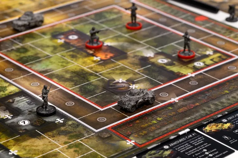 Board game with soldiers, tank, and terrain on a grid map.
