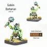 A green-skinned Goblin Barbarian stands proudly, wielding a spiked mace raised high. The miniature features intricate details, including a horned helmet and a rugged outfit, with a small red gem at the waist. The base is adorned with tufts of grass, and the text "Goblin Barbarian" and "Alternative Armies 28mm Scale" are displayed alongside the figure.