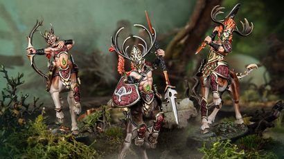 A trio of elven centaur models from the Kurnoth’s Heralds warband stands prominently in a lush, forested setting. Each figure is intricately detailed, featuring ornate armor and antlered helmets, with vibrant colors highlighting their unique designs. The central figure wields a spear and shield, while the others are posed with weapons, showcasing their readiness for battle amidst a backdrop of moss and twisted branches.
