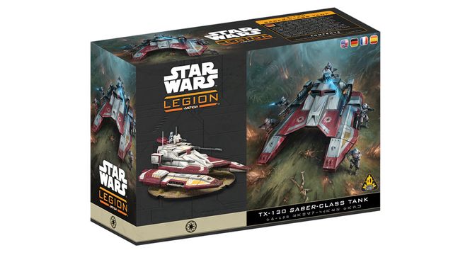 A box for the TX-130 Saber-class Tank expansion from Star Wars: Legion features a prominent illustration of the tank in action, showcasing its sleek design with red and white accents. The box also displays the miniature of the tank prominently on the front, alongside the game's logo and title. The background depicts a lush battlefield scene, enhancing the thematic elements of the Galactic Republic's military presence.