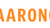 Bold orange text spelling "AARON" against a black background. This design likely represents the branding for the board game convention organized by Aaron, highlighting the event's name prominently. The simplicity of the text emphasizes the focus on the convention itself.