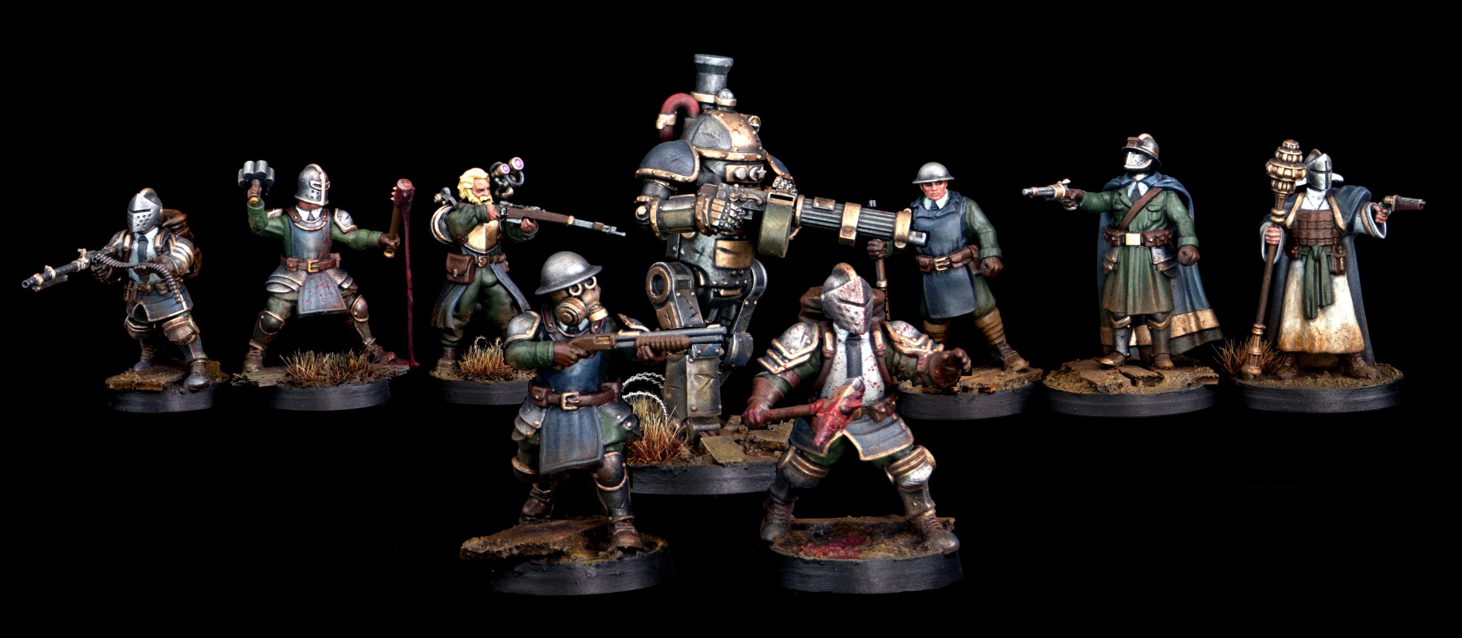 A group of six intricately detailed miniatures stands against a black background, showcasing a variety of characters from Wargames Atlantic's Trench Missionaries. The figures include a large, armored robot with a top hat, a soldier in a gas mask holding a rifle, and several others dressed in military-style attire, some wielding weapons like rifles and a staff. The bases are textured with grass and dirt, enhancing the overall battlefield aesthetic.
