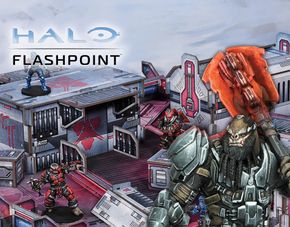 A detailed gaming scene from Halo: Flashpoint features a futuristic battlefield with intricately designed terrain and structures. In the foreground, a blue-armored character stands on a raised platform, while two red-armored figures engage in action nearby. The backdrop showcases a variety of buildings with sci-fi elements, emphasizing the game's immersive environment. The title "HALO FLASHPOINT" is prominently displayed at the top.