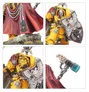 A dynamic miniature of Darnath Lysander in his iconic yellow Terminator armour, showcasing intricate details such as the relic storm shield Rampart and the Fist of Dorn power hammer. The figure stands on a rocky base, adorned with a flowing red cape and various insignia, including a prominent eagle motif on the shield. Close-up views highlight the craftsmanship of the hammer and the ornate decorations on his armour.