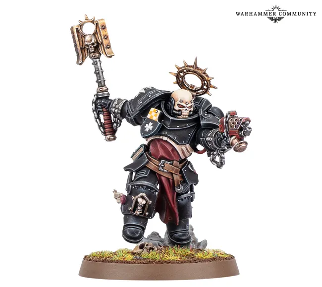 A Black Templars Execrator stands in a dynamic pose, wielding a large, ornate power hammer in one hand and a pyre pistol in the other. The figure is clad in black armor adorned with gold and silver details, including a skull motif on the helmet and a purity seal on the chest. The base features a grassy terrain with scattered skulls, enhancing the grim aesthetic typical of the Warhammer 40,000 universe.