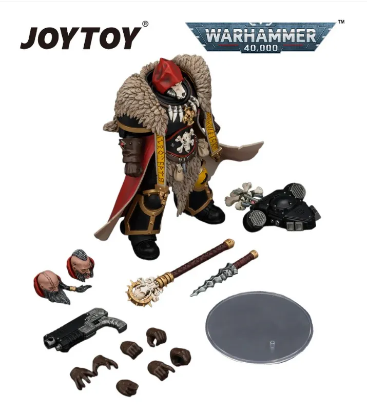 A stylized action figure of a character in ornate armor with a fur-lined cloak, red cape, and detailed accessories. The figure has a helmet with a red plume, exposed fangs, and a skull emblem on the chest. Surrounding the figure are interchangeable parts: two heads with helmets, multiple hands, a mace with a spiked head, a dagger, a pistol, a backpack with exhaust-like details, and a circular base. The text "JOYTOY" appears in black at the top left, and "WARHAMMER 40,000" is displayed in a blue and silver banner at the top right.