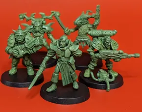 A group of five 28mm scale sci-fi miniatures is displayed against a bright red background. The figures include a Space Commando wielding a rifle, a Starchild with a distinctive helmet, an Assault Goar holding a sword, a Space Orc with a large gun, and a Voidborn equipped with various gadgets. Each miniature features intricate details and a classic old-school aesthetic, showcasing the unique character and charm of the RT Adventurer Pack II from Satyr Art Studios.