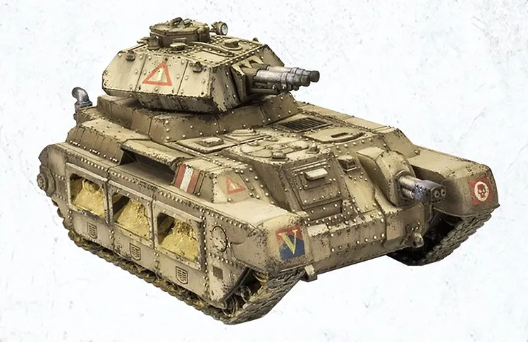 A detailed model of an armoured vehicle, resembling a tank, features a rugged design with a sandy beige color and various markings, including triangular symbols and a 