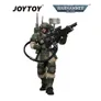Armored soldier in green and beige holding a large gun, with "JOYTOY" and "WARHAMMER 40,000" text.