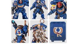 A collection of Ultramarine miniatures showcases various Space Marine figures in blue armor, each featuring distinct details and accessories. The top row includes a character with a prominent helmet and ornate chest emblem, alongside two other figures with different poses and weaponry. The bottom row features a close-up of a figure holding a weapon, another with a skull motif on the armor, and a character wielding a large, intricately designed shield. Additionally, a transfer sheet with various decals is visible, featuring Ultramarine symbols and decorative borders.