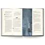 Open book with text and an image of a futuristic tower in space.