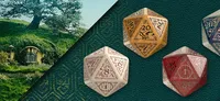 Ornate 20-sided dice in gold, red, and blue with intricate designs and numbers.