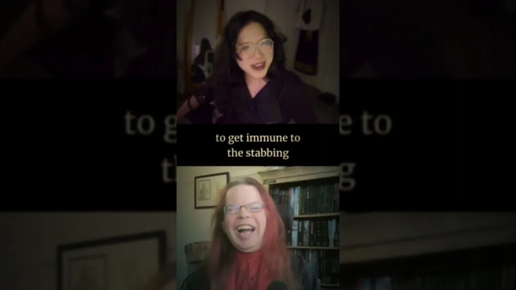 Two individuals are engaged in a lively conversation, with one person on the top half of the image and the other on the bottom. The person at the top has dark, wavy hair and is wearing glasses, while the person at the bottom has long, reddish hair and is also wearing glasses. The background features shelves filled with books and other items, suggesting a cozy, personal space. Subtitles appear on the screen, with the phrase "to get immune to the stabbing" prominently displayed, adding a humorous and intriguing context to their discussion.