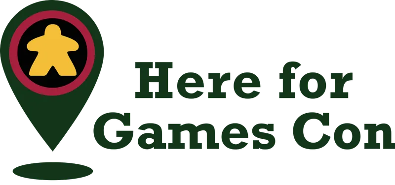 A logo for Herefordshire Board Gamers features a stylized game piece in yellow, resembling a meeple, set against a black circular background. This circle is bordered by a red ring, all contained within a green location pin shape. The text "Here For Games" is displayed to the right in a bold, dark green font.
