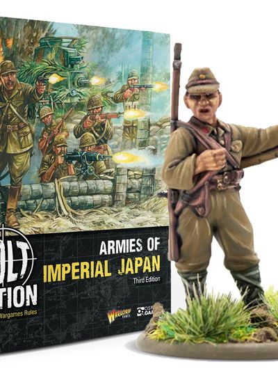 A book titled "Armies of Imperial Japan" from Warlord Games is prominently displayed, featuring a colorful cover illustration depicting Japanese soldiers in action, with a backdrop of explosions and military equipment. The book is positioned upright, showcasing its spine and cover, while a detailed 28mm miniature of a Japanese soldier is placed in the foreground, emphasizing the theme of the game. The text on the cover highlights the book's focus on World War II wargaming rules for the Imperial Japanese Army.