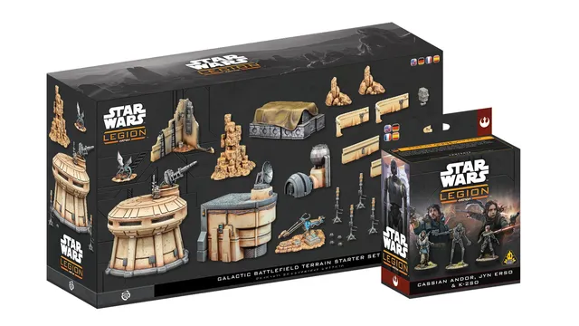 A display featuring two new Star Wars: Legion packs. The top pack, labeled "Battlefield Terrain Starter Set," showcases various terrain pieces, including modular buildings and scatter elements, designed with a Star Wars aesthetic. The bottom pack, titled "Cassian Andor, Jyn Erso & K-2SO," features three character miniatures alongside artwork of the characters, emphasizing their roles in the Star Wars universe.