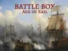 A dramatic scene depicts several sailing ships engaged in battle, with smoke billowing from cannons and the ocean waves churning around them. The ships, featuring billowing sails and intricate rigging, are set against a backdrop of a cloudy sky, enhancing the sense of action and tension. The title "BATTLE BOX Age of Sail" is prominently displayed at the top in bold red letters, indicating the game's theme.