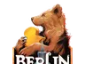 A colorful logo for the Berlin Brettspiel Con 2026 features a stylized bear holding a piece of cheese, set against a dark background. Below the bear, a prominent tower-like structure is depicted, surrounded by game elements such as dice and scattered game pieces. The event name "BERLIN Brettspiel Con" is displayed in bold, eye-catching letters, with the year "2026" clearly indicated at the bottom.
