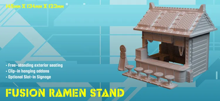 A small, single-floor building designed as a ramen stand, featuring a traditional roof and an open front. It includes free-standing exterior seating, clip-in hanging addons, and optional slot-in signage. The structure is presented in a light color against a blue geometric background, with dimensions noted as 145mm x 134mm x 123mm.