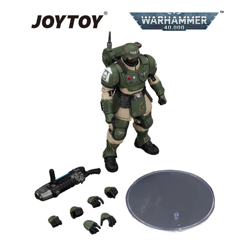 Green armored figure with helmet, gun, interchangeable hands, and circular base. JOYTOY and Warhammer 40,000 logos.