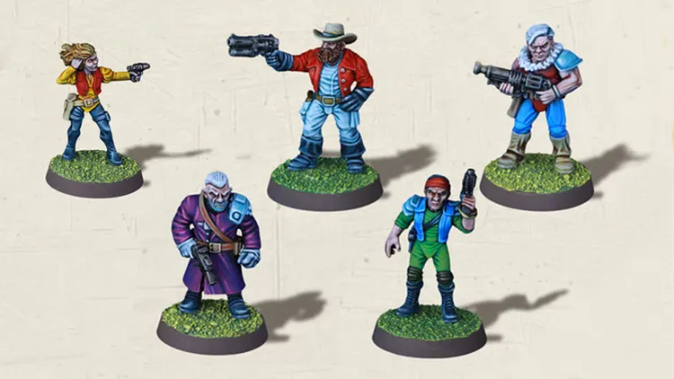 Four colorful tabletop miniatures are displayed on circular bases with grassy textures. The characters include a cowboy with a hat and a revolver, a bearded man in a red and blue outfit holding a futuristic weapon, a man in a green outfit with a red cap and a pistol, and an older man in a purple robe with a gun. Each figure is intricately detailed, showcasing vibrant colors and distinct poses.