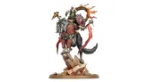 A goblin leader named Droggz da Sunchompa rides a large, fierce wolf, both positioned atop a rocky base. The goblin is adorned in armor with red and black details, holding a shield and a weapon, while a large, fiery wheel is mounted behind him. The wolf features a menacing expression and is equipped with armor, emphasizing the dynamic and aggressive nature of this miniature.