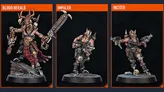 The image showcases three miniatures from the upcoming Kill Team expansion. On the left is the Blood Herald, a large figure adorned with skulls and wielding a massive chainsaw-like weapon, standing on a rocky base. In the center is the Impaler, a more compact figure equipped with a spear and wearing rugged armor, while on the right is the Inciter, who holds a firearm and features a dynamic pose, both standing on circular bases. Each miniature exhibits intricate details and a fierce aesthetic, fitting the chaotic theme of the Goremongers.